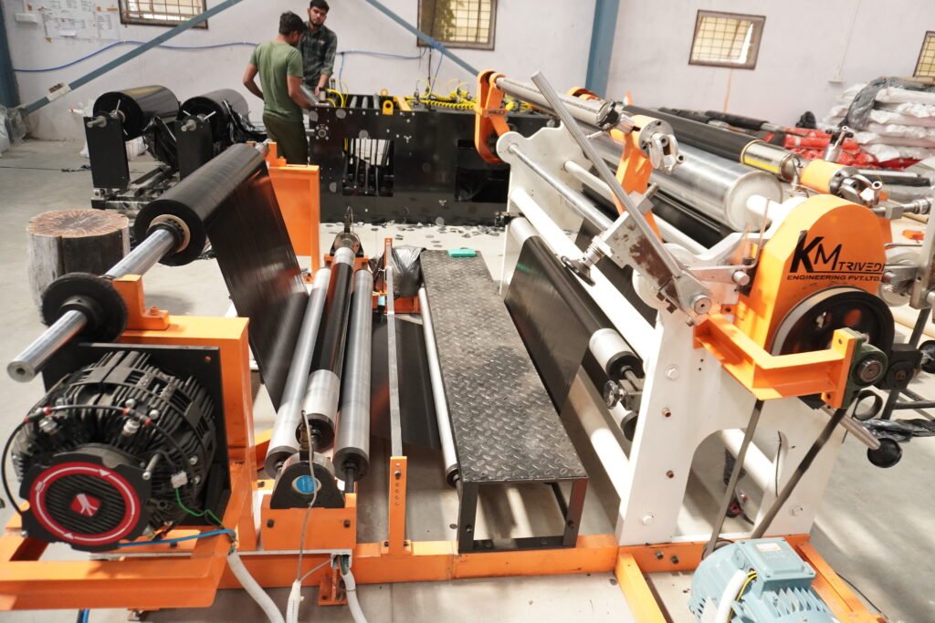 A machine designed for producing rolls of mulch film paper, showcasing its industrial components and functionality.jpeg